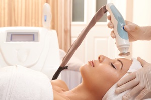 woman getting dermabrasion treatment