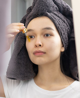 woman using BioRestore Complete