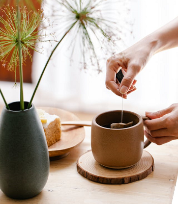 woman making cup of tea